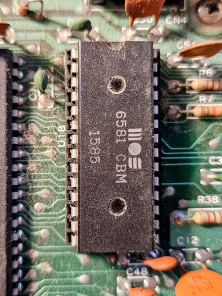 6581 SID chip in its natural habitat on a C64 board.